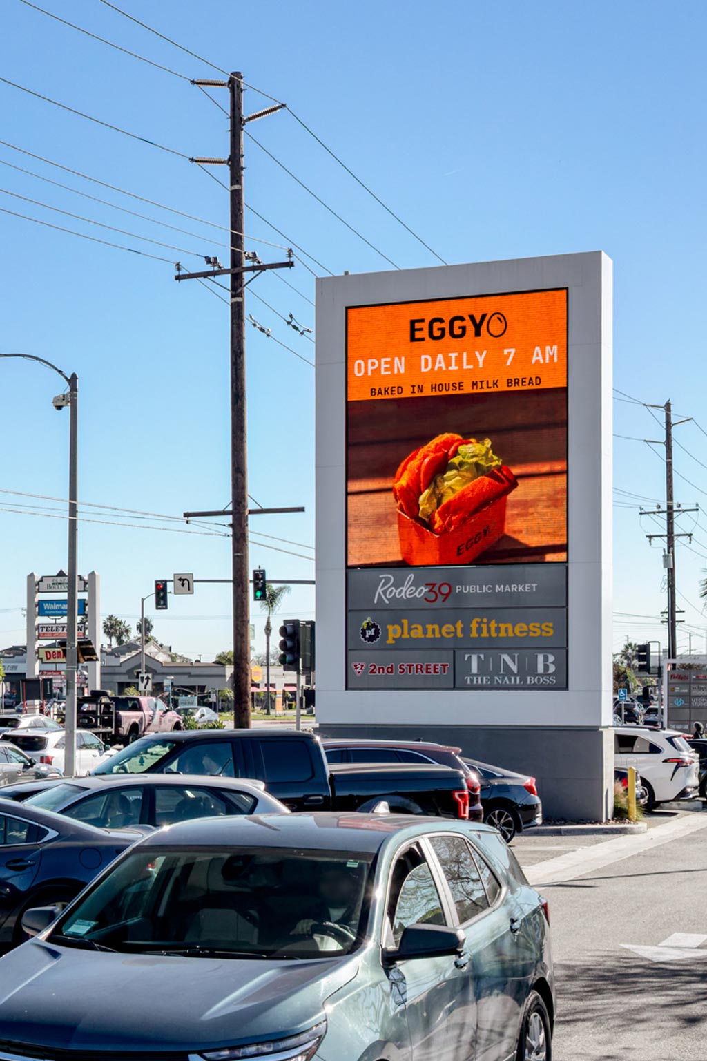 Digital billboard on Beach Blvd and Acacia near the 22 Freeway in Stanton CA showing close-up traffic view